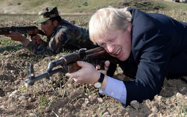 London Mayor Boris Johnson takes aim with an AK47