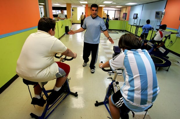 Puerto Rican children train on stationary bikes inside the gym in Guaynabo, Puerto Rico.