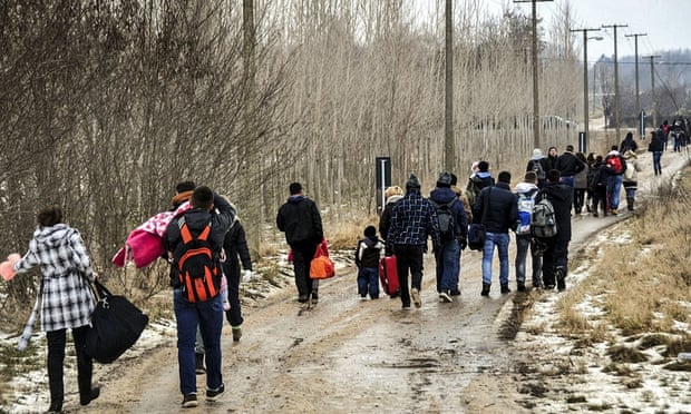 Kosovans in Belgrade, Serbia, head for buses to Subotica, the nearest city to the Hungarian border, to try to enter the EU country.