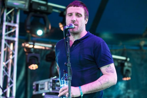 Jason Williamson of Sleaford Mods performing in August 2014.
