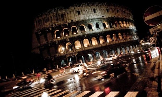 the Roman Colosseum by night.