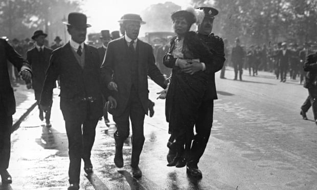 Police remove Emmeline Pankhurst from a suffragette protest, 1914. 'Women who don’t vote are telling