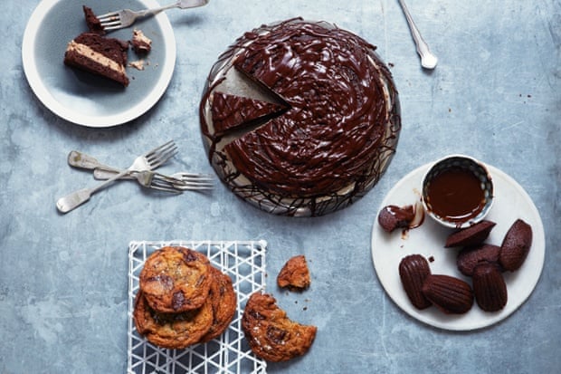 Trio of treats: the ultimate chocolate chip cookies (bottom left), boozy Prague cake (top) and chocolate madeleines with fudgy chocolate dip (bottom right).