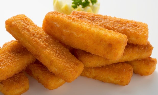 Fish fingers in a heap. The price of fish fingers has dropped 12% despite rising global food prices.