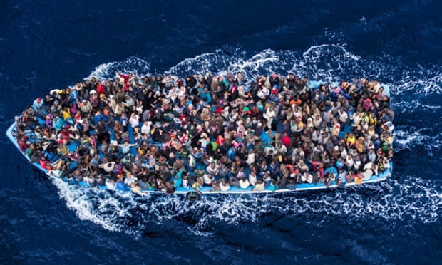 Asylum seekers aboard their overcrowded boat