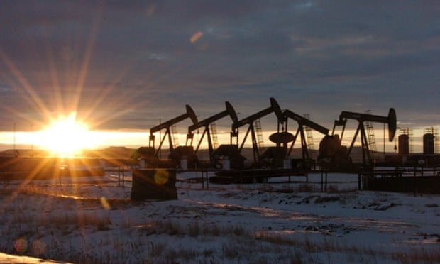 Rigs drilling for oil in the area around McKenzie County, western North Dakota, US.