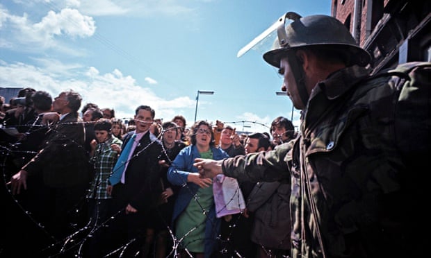 The British Army face protesters in West Belfast in 1981.