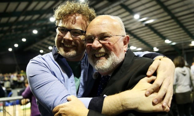 Senator David Norris (right) is welcomed by Andrew Hyland of YES Equality at the count in Dublin earlier today.