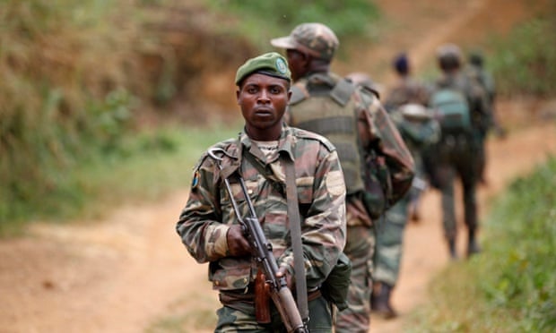 DRC military personnel patrol against rebel groups near Beni in North Kivu province.
