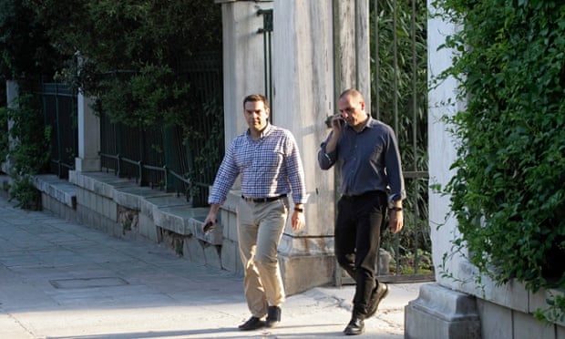 Greek Prime Minister Alexis Tsipras, left, with the Finance Minister, Yanis Varoufakis a walk in the center of Athens.