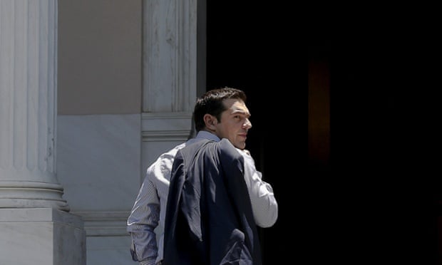 The Greek prime minister Alexis Tsipras looks on as he arrives at this office at Maximos Mansion in Athens June 20, 2015