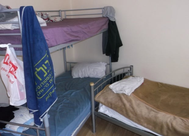A first floor front bedroom containing one bunk bed and three single beds