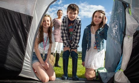 children looking into tent