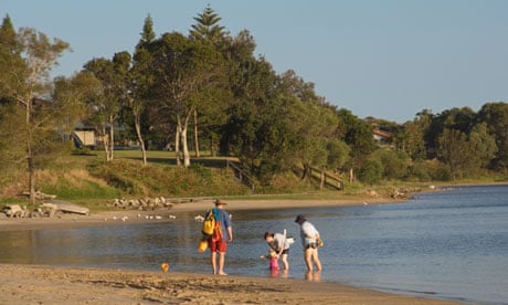 Family on the beach at Iluka, New South Wales