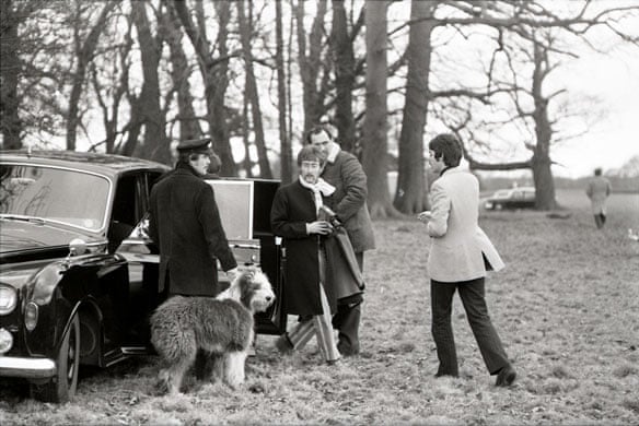Jane Bown and The Beatles: John Lennon and Paul McCartney with their limo and chauffeur in Knole Park