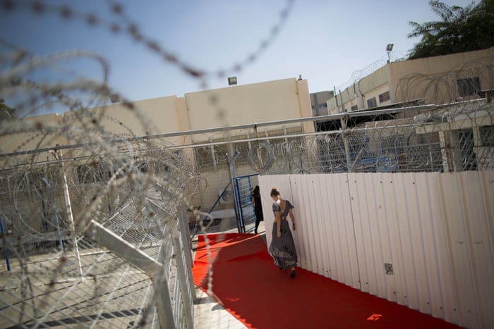 A model prepares for a fashion show in Israel’s Neve Tirza prison, the only female jail in the country. The show featured clothing designed and made by inmates.