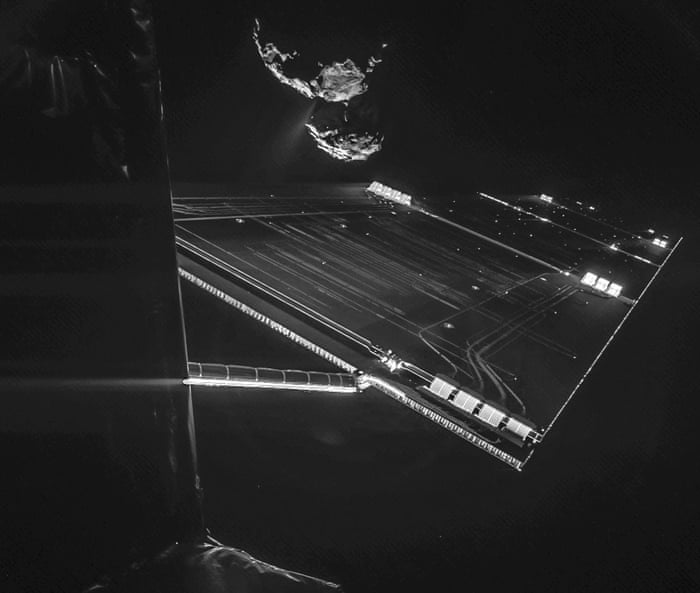 A picture taken with the CIVA camera on Rosettas Philae lander showing comet 67P/ChuryumovGerasimenko from a distance of about 16 km from the surface of the comet. The 'selfie' image was taken on October 7, 2014 and captures the side of the Rosetta spacecraft and one of Rosettas 14 m-long solar wings, with the comet in the background. Two images with different exposure times were combined to bring out the faint details in this very high contrast situation. The comet's active neck region is clearly visible, with streams of dust and gas extending away from the surface.