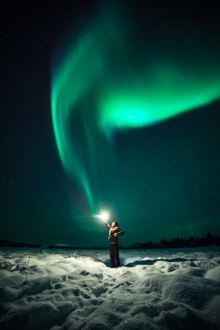 A young wizard casts the “lumos” spell causing the Northern Lights to appear in the Lappish firmament.
