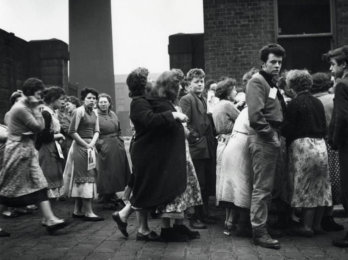Rochdale by election, 1958.  Voters from a cotton mill wait to be addressed by one of the candidates