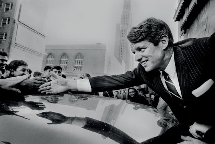 From Photographer's Paradise by Jean-Pierre Laffont. Presidential candidate and New York senator Robert Kennedy greets supporters during a campaign stop in Fort Greene, Brooklyn.