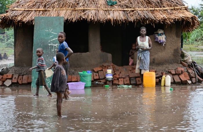 Family waits for relief during Malawi flooding