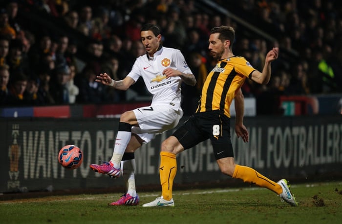 Tom Champion tackles Angel Di Maria as Cambridge United continue to frustrate United.