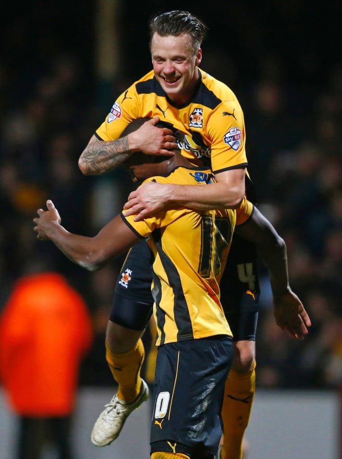 Cambridge United hold on and Josh Coulson celebrates with Tom Elliott at the final whistle
