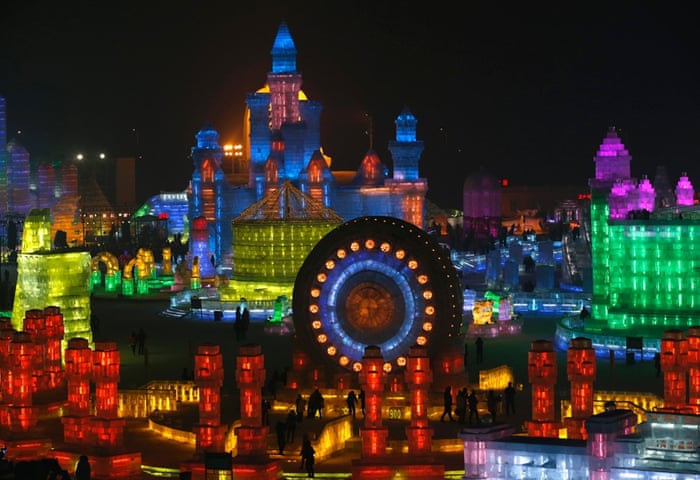 Huge ice sculptures illuminated by coloured lights