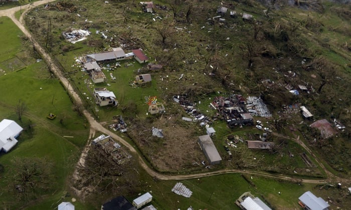 An aerial image above the suburbs of Port Vila shows damages inflicted to buildings in Vanuatu by cyclone Pam.