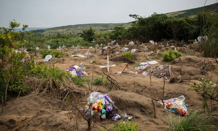 Flowers are seen at the mass common grave at Maluku, near Kinshasa. Authorities claim stillborn babies and unclaimed corpses are buried at the site.
