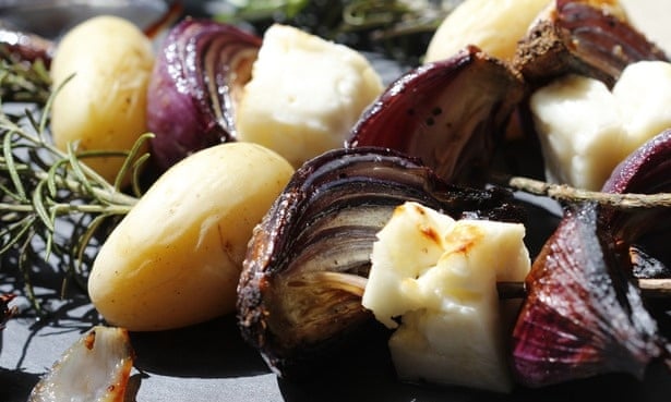 Toasted halloumi, new potatoes and roasted red onion on herby skewers