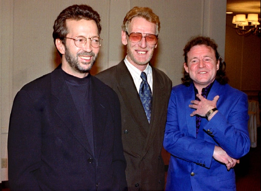 Eric Clapton, Ginger Baker and Jack Bruce, members of the former band Cream are inducted into the Rock and Roll Hall of Fame in Los Angeles, 12 January 12 1993