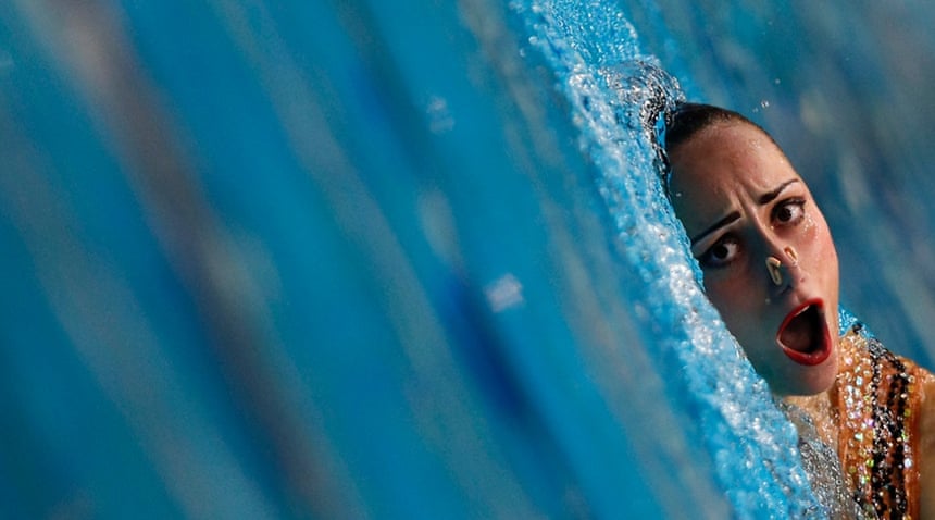 15 August: Ukraine’s Anna Voloshina performs in the synchronised swimming solo free routine preliminaries during the European Swimming Championships in Berlin, Germany