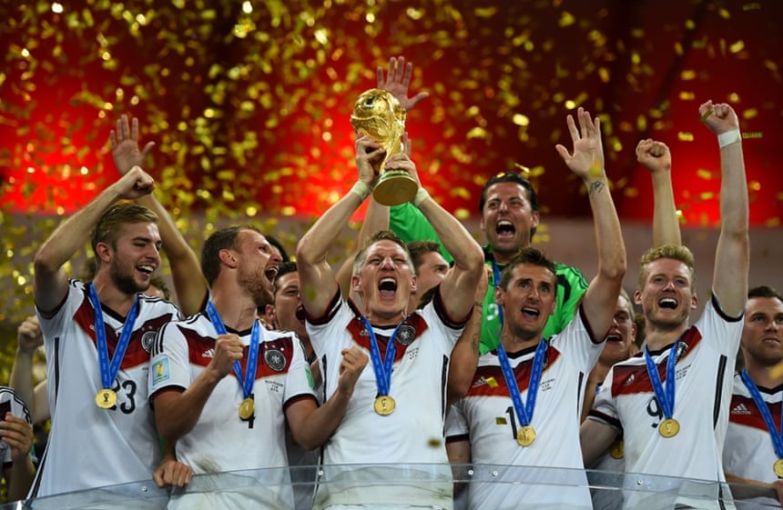 13 July: Bastian Schweinsteiger of Germany lifts the World Cup