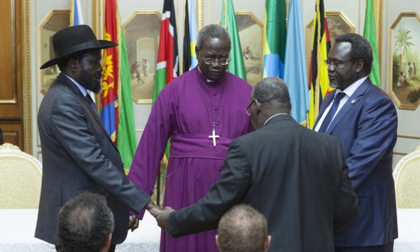 South Sudan president Salva Kiir left, and rebel leader, Riek Machar, right, conclude a ceasefire in May 2014, one of seven that has failed to deliver a cessation of hostilities.