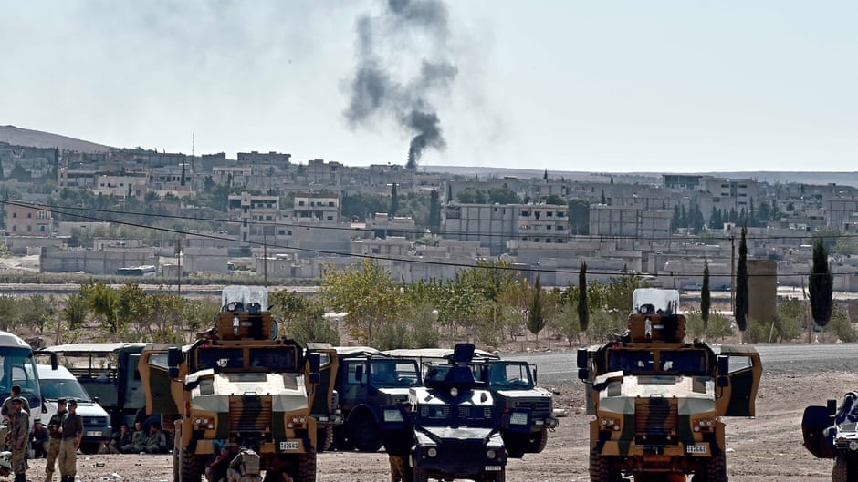 Smoke rises from the Syrian town of Kobane