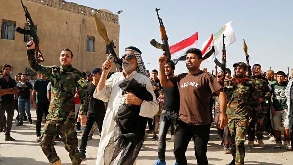 Anti-Isis volunteer fighters in Baghdad's Sadr City