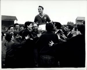 Greaves is carried off the field by Chelsea fans after his last game  for the club
