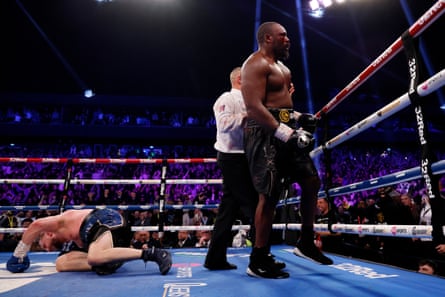 Derek Chisora knocks down Otto Wallin in the 12th round of the IBF world heavyweight title eliminator in Manchester last year.
