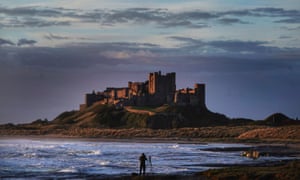 A photographer lines up his shot at Bamburgh Castle in Northumberland.