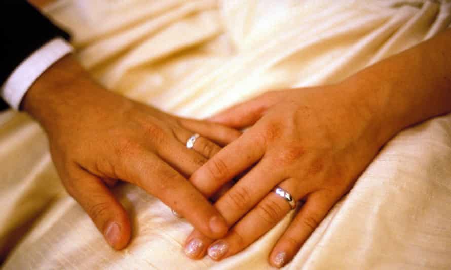 Bride and groom, hands and rings
