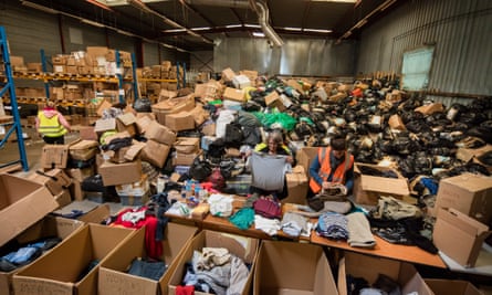 Volunteers sort through donations