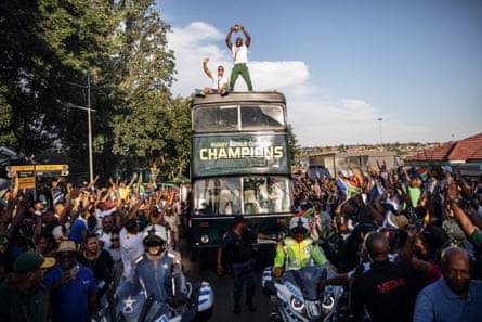 South Africa captain Siya Kolisi celebrates winning the Rugby World Cup with fans in November 2019.