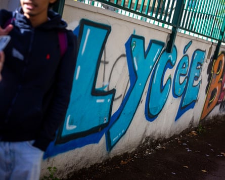 Graffiti of the school’s name on a wall
