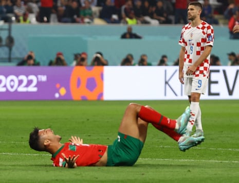 Morocco's Achraf Dari celebrates scoring their first goal.