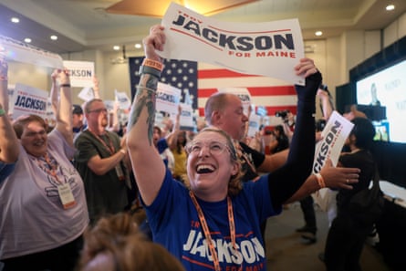 a women holding a sign