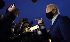 Joe Biden in mask speaking to reporters