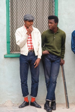Hanging out in Watts, Los Angeles, California, 1966Photographer Bill Ray returned to LA suburb Watts, a year after the violent riots of 1965 for Life Magazine and in doing so documents one of the city’s gangs wearing Black Ivy in fine style. Playing with proportions, mixing the classic Ivy League wardrobe with workwear is as cool today as it was then.