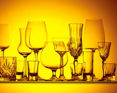 Silhouettes of different empty glasses on a yellow background.