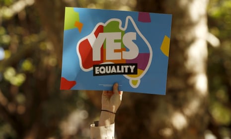 A marriage equality supporter in Sydney hold a placard. 